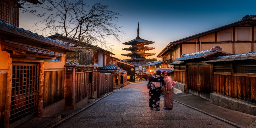 two ladies standing on the Streets of Kyoto Japan