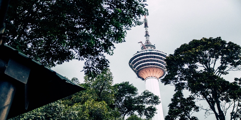 A towering landmark offering panoramic views of Kuala Lumpur's skyline and surrounding areas.