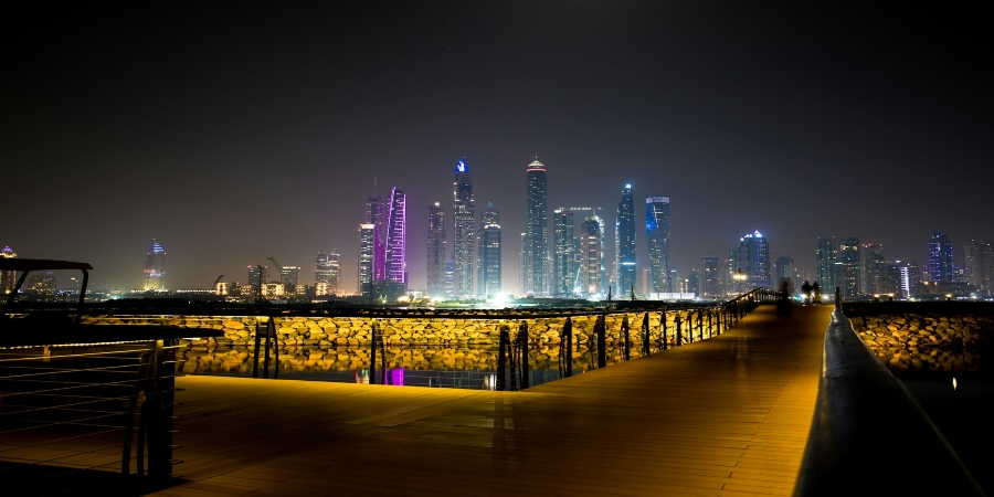 A captivating view of Dubai Marina, with its sleek skyscrapers and shimmering waters creating a vibrant, upscale urban landscape.