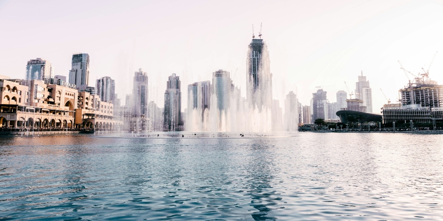 A stunning far view of Dubai Mall, showcasing its grandeur and the vibrant surroundings, a must-see landmark in the heart of the city.