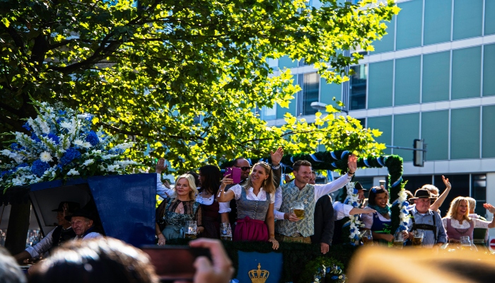 People celebrating festivities and clicking pictures at Oktoberfest