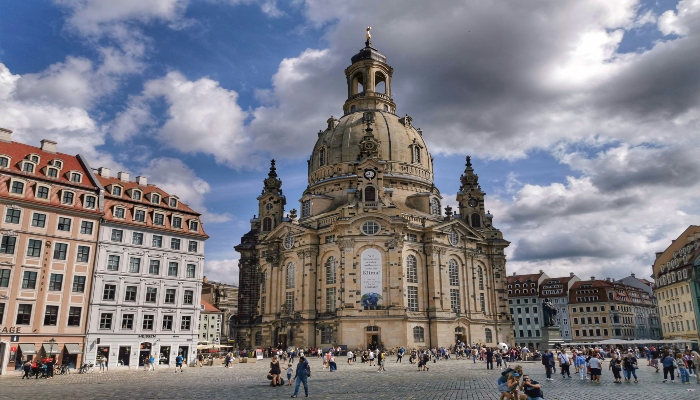 Frauenkirche and bustling city square on a cloudy afternoon, showing Munich in one day highlights for city explorers.