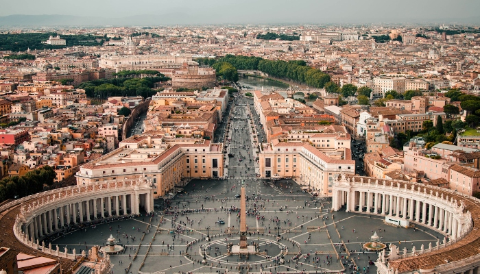 Aerial view of St. Peter’s Square and Vatican City, emphasizing crowd patterns and travel planning tips found in do’s and don’ts in Rome articles.