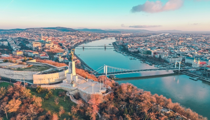 Aerial view of Budapest with the Danube and city bridges, showing is hop-on hop-off worth it Budapest coverage.
