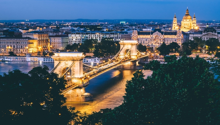Chain Bridge over the Danube at night, scenic highlight when deciding is hop-on hop-off worth it Budapest.