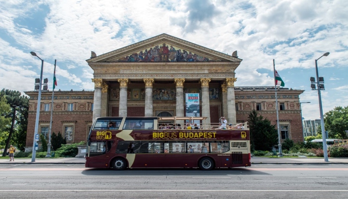 Big Bus Budapest hop-on hop-off tour passing the Hungarian State Opera House in the city center.