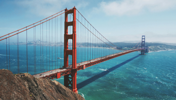 Golden Gate Bridge stretching across San Francisco Bay with ocean views on a sunny day