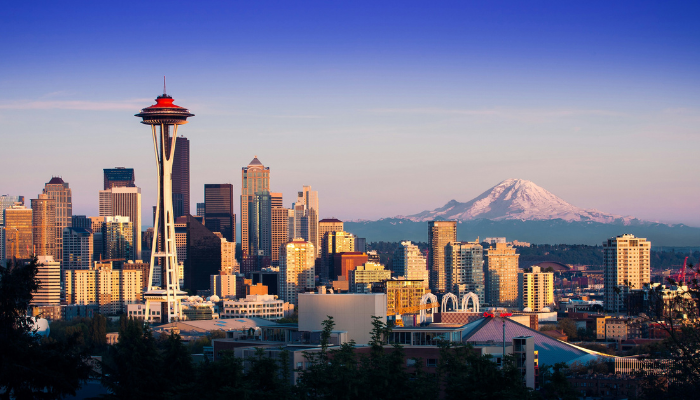 Seattle skyline with the Space Needle and Mount Rainier visible in the background