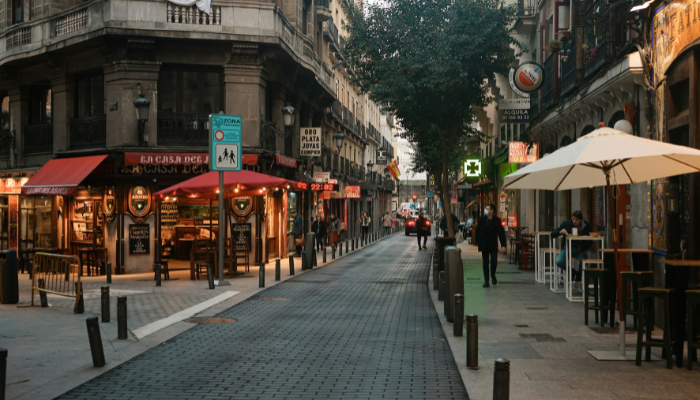 Traditional cafés and pedestrian streets in Madrid's literary Barrio de Las Letras district.