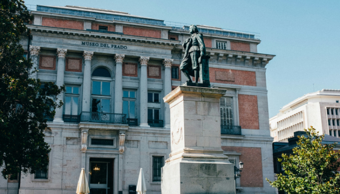 Prado Museum entrance with the statue of Diego Velázquez in central Madrid.