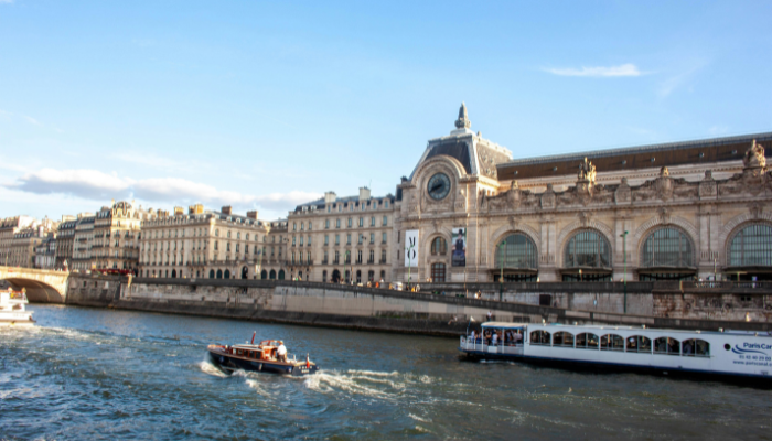 The historic Musée d'Orsay building on the banks of the River Seine, housed inside a beautifully restored former railway station.