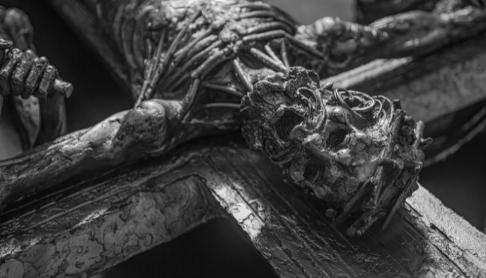 Close-up black-and-white view of a historic sculpture detail in Liverpool
