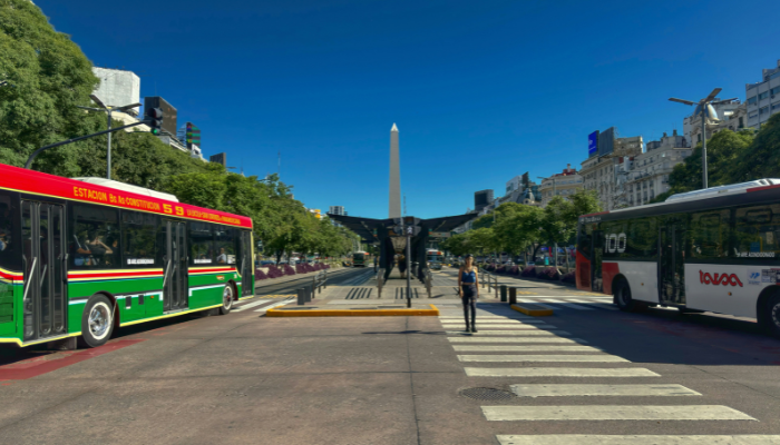 City buses and the Buenos Aires Obelisk on Avenida 9 de Julio